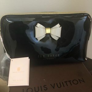 Ted Baker cosmetic bag.. can be used as a clutch